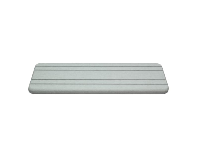 May include: A rectangular, light gray shelf with rounded edges. The shelf has several evenly spaced, dark gray horizontal lines across its surface. The shelf is designed to be mounted on a wall or used as a display surface.