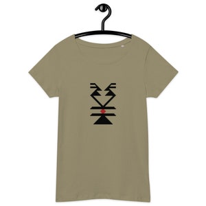 May include: An olive green scoop neck t-shirt with a black and red geometric design. The design features angular shapes and a central red accent. The t-shirt is hanging on a black hanger.