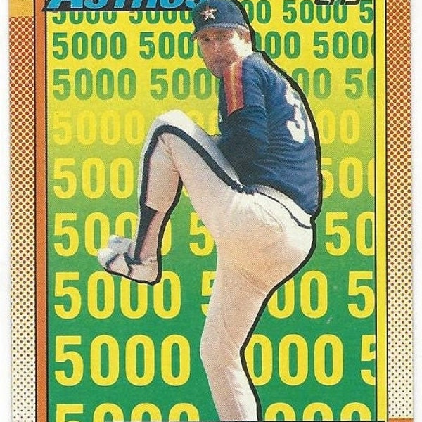 1990 NOLAN RYAN Houston ASTROS Vintage Topps Baseball Card Number 4 in Near Mint condition .... Free U S Shipping