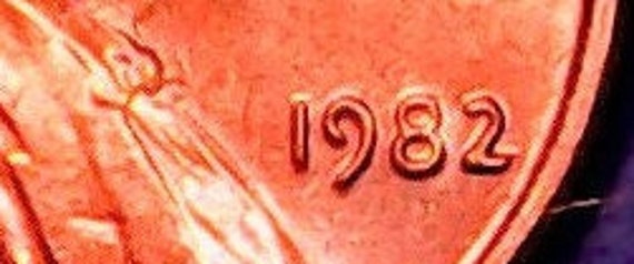 1982 large date Lincoln cent copper penny. Uncirculated in RED MS