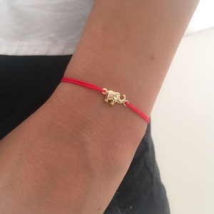 Red bracelet with elephant meaning Clearance