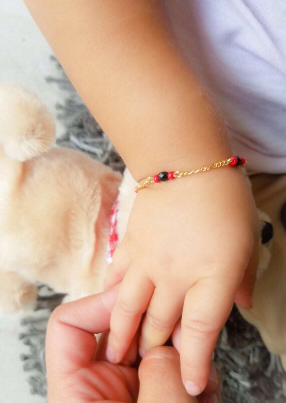 azabache para bebes de oro