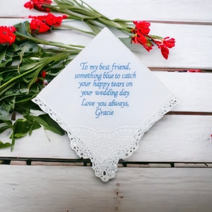 Our customizable white Something New, Something Blue lace trimmed handkerchief. Make sure to let us know what text you would like us to embroider on the handkerchief using the Add your personalization field below.