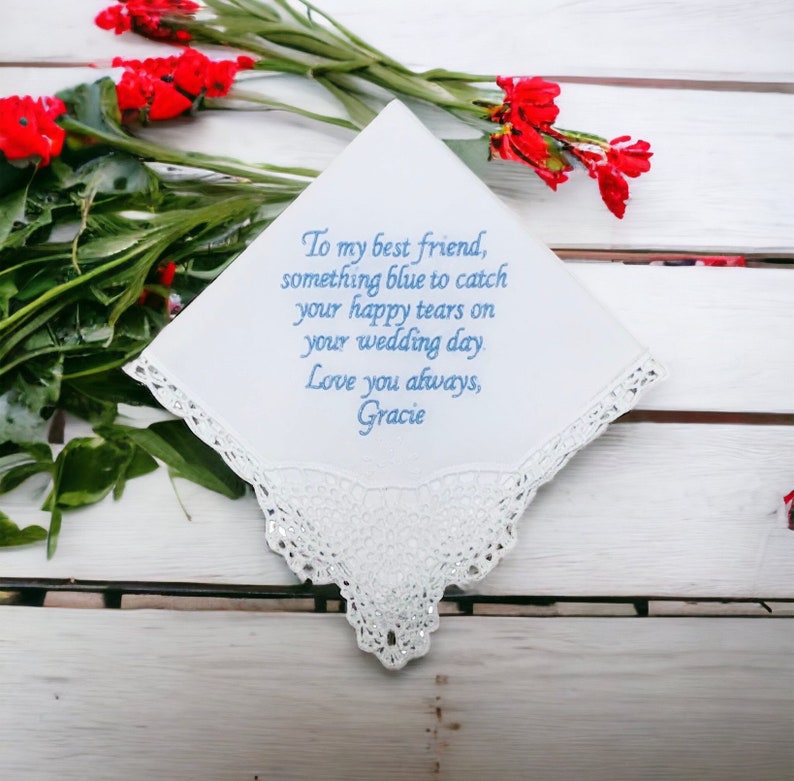 Our customizable white Something New, Something Blue lace trimmed handkerchief. Make sure to let us know what text you would like us to embroider on the handkerchief using the Add your personalization field below.