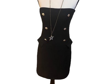 Vestido vintage negro cruzado con botones plateados