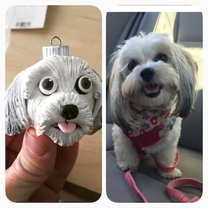 May include: A two-part image. On the left, a handmade dog ornament with a gray and white color scheme, featuring large eyes and a pink tongue. On the right, a small, fluffy dog wearing a red harness and bandana.