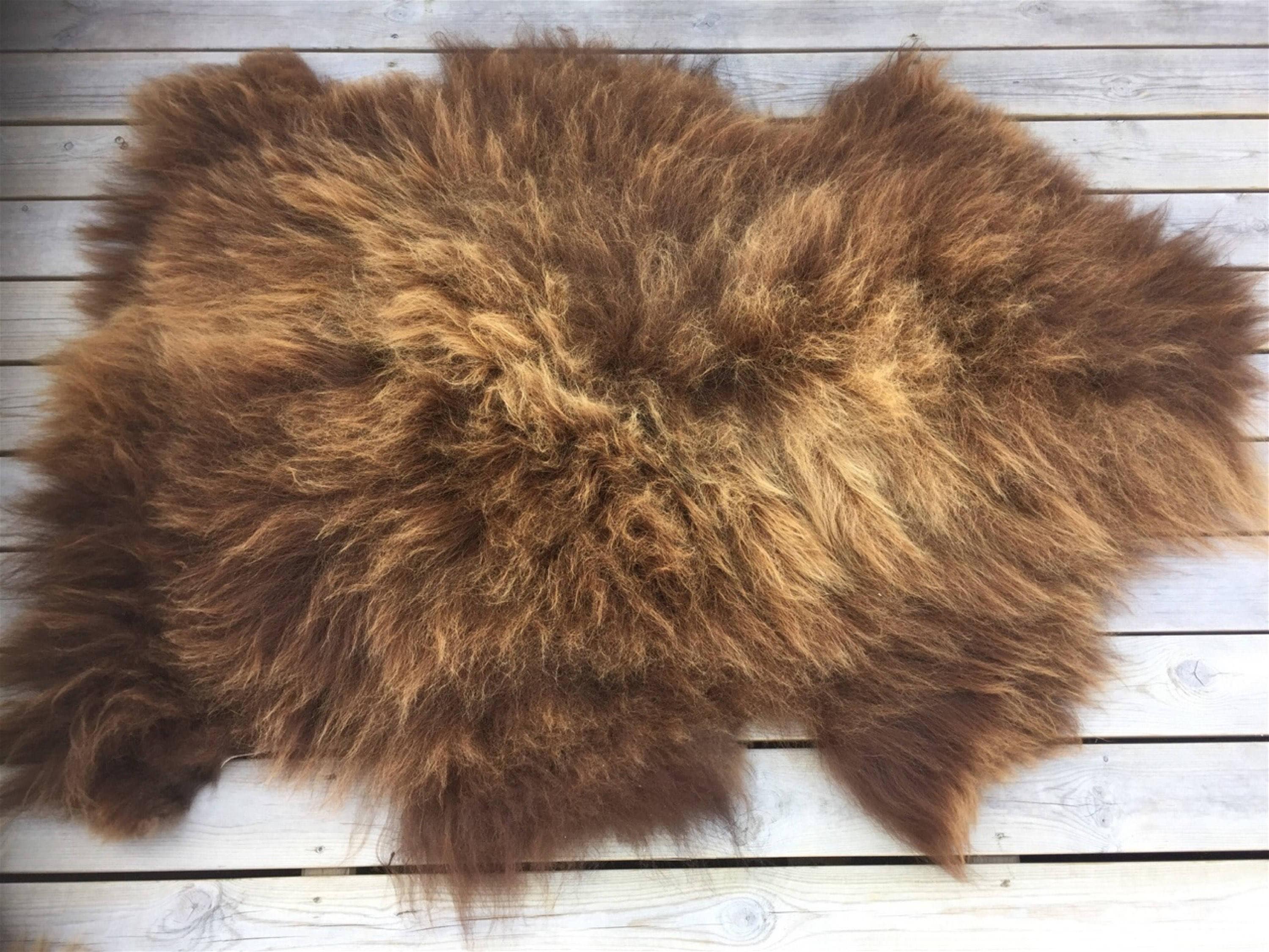Rugged and longhaired sheepskin rug. Brown 17123