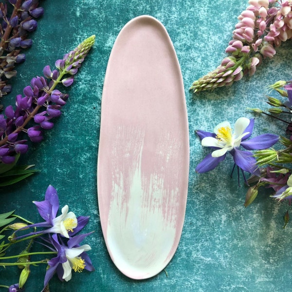 Pink and white stoneware platter