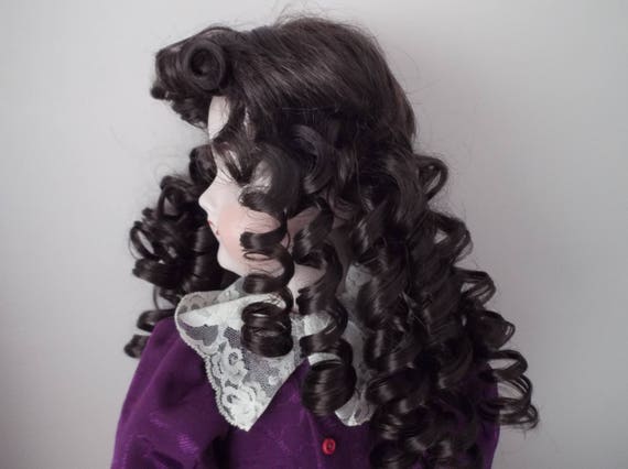 11-12 inch ECONOMY DOLLS WIG IN CURLY BUNCHES DARK BROWN
