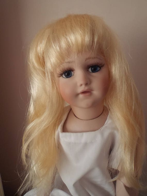 11-12 inch ECONOMY DOLLS WIG IN CURLY BUNCHES DARK BROWN