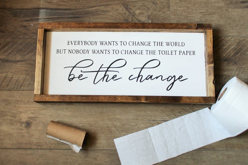 Everyone wants to change the world bathroom sign Be the image 0