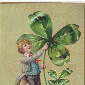 St Patricks Day Postcard Little Boy Holding Giant Four Leaf Clover Tuck Publishing Series 106