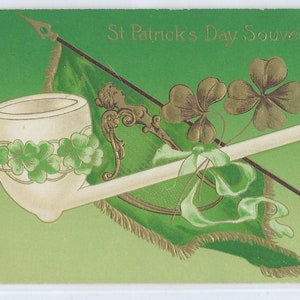 St Patrick&#39;s Day Postcard Gold Embossed White Pipe with Shamrock Clover Over Irish Flag John Winsch Publishing