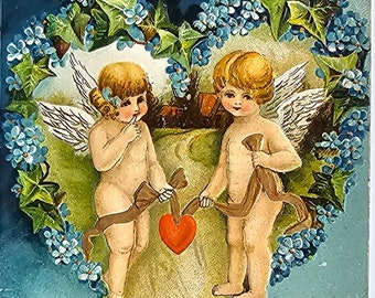 Valentine Postcard Embossed Cupids Tying Heart on Dirt Path Blue Flowers and Background Series V13 Printed in Saxony