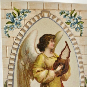 Easter Postcard Angel Holding Lyre in Window with Flowers