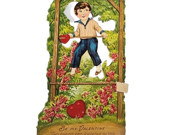 Vintage Die Cut Valentine Mechanical Card Boy Balancing on Rope Among Roses in Forest