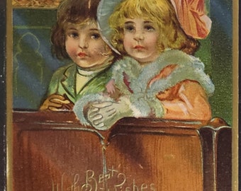 Christmas Postcard Children Dressed in Winter Coats Seated in Church Pew Gold Highlights