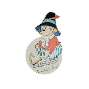 Vintage Merry Christmas Child in Hat Bouncing String
