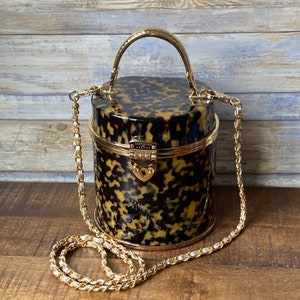 Schöne Aspinal of London Pandora Bucket Bag Geflecktes Plexiglas Goldfarbene Metallwaren