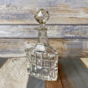 Botella de perfume de cristal de cristal de plomo antiguo con tapón de forma inusual