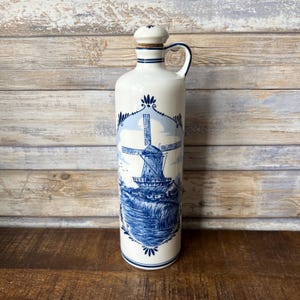Vintage Blue Delft Ceramic Bottle Decanter Decorated with Rural Windmill Scene and Floral Motifs Holland