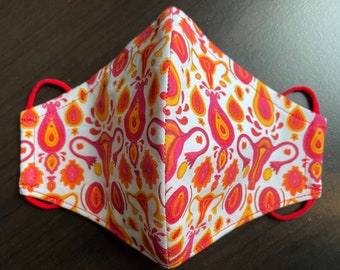 Yoni mask in reds and oranges