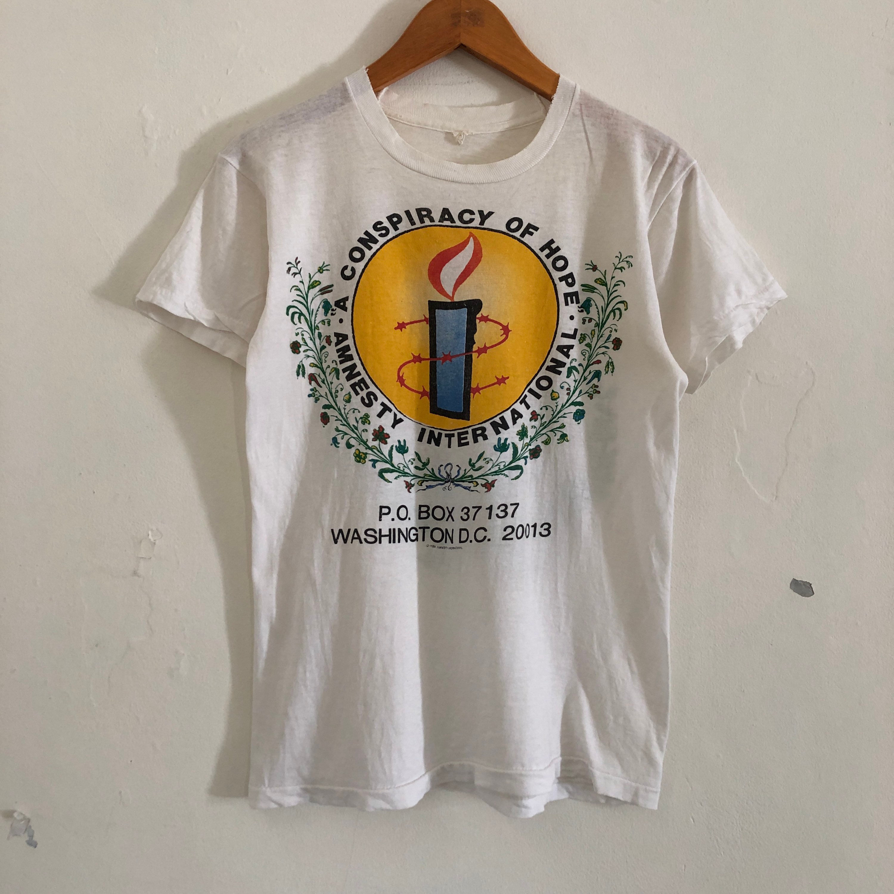 T shirt amnesty international hotsell