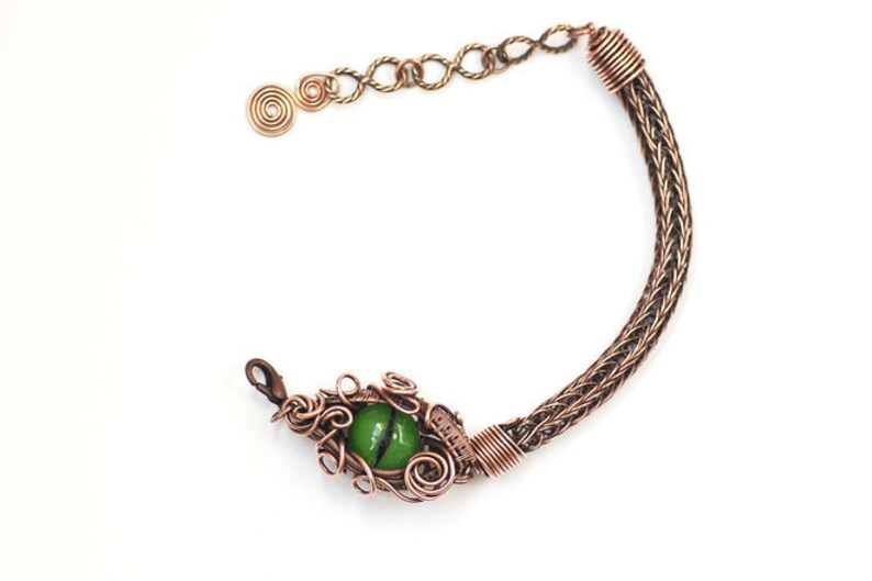Dragon eye antiqued copper viking weave bracelet