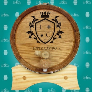 May include: A wooden barrel with a metal band and a wooden tap. The barrel is decorated with a crest featuring a shield with the letters L and C, a crown, and the text "LOPEZ CASTRO".