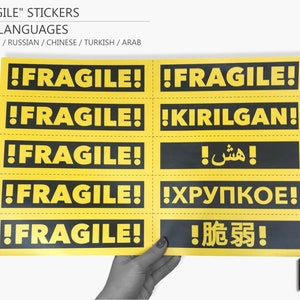 fragile stickers in 5 languages | sticky label for delicate baggage