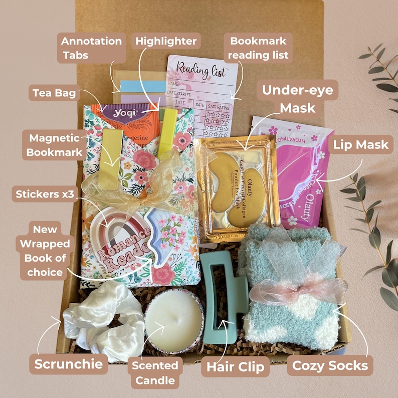 May include: A gift box filled with self-care and reading essentials. Includes a new wrapped book, tea bag, face masks, cozy socks, scrunchie, hair clip, scented candle, and a reading list. Also includes a magnetic bookmark, annotation tabs, highlighter, and stickers.