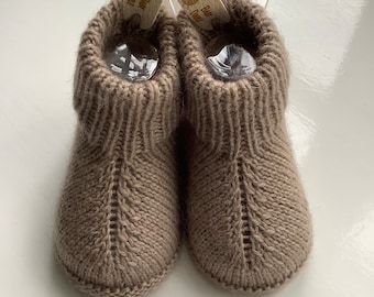 Soft pure cashmere newborn baby boots, hand knitted in light, super-fine, natural yarn. A lovely shade of mocha brown, beautifully packaged.
