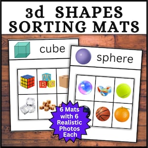 May include: Educational 3D shapes sorting mats. The mats feature the words "cube" and "sphere" with corresponding images. The mats include 6 realistic photos each. The text "3d SHAPES SORTING MATS" is at the top.