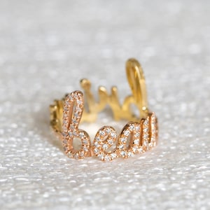 以下が含まれることがあります： 小さなダイヤモンドが敷き詰められた、