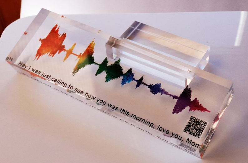 May include: A clear acrylic block with a rainbow-colored sound wave graphic and the text "Hey I was just calling to see how you was this morning, love you, Mom".