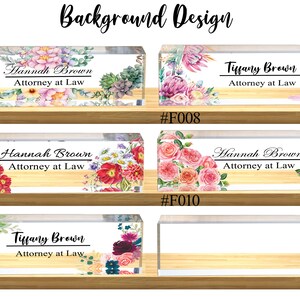 May include: Four acrylic desk nameplates with floral designs. The nameplates feature the text "Hannah Brown, Attorney at Law" and "Tiffany Brown, Attorney at Law".