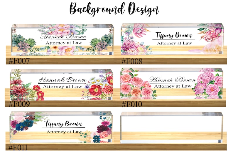 May include: Four acrylic desk nameplates with floral designs. The nameplates feature the text "Hannah Brown, Attorney at Law" and "Tiffany Brown, Attorney at Law".