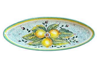 Bandeja ovalada de cerámica artística italiana con diseño de limones pintados a mano. Hecha en Italia, Toscana, Florencia.