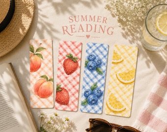 May include: Four rectangular bookmarks featuring watercolor fruit illustrations on gingham backgrounds. The designs include peaches on orange, strawberries on red, blueberries on blue, and lemon slices on yellow. The text SUMMER READING is visible.
