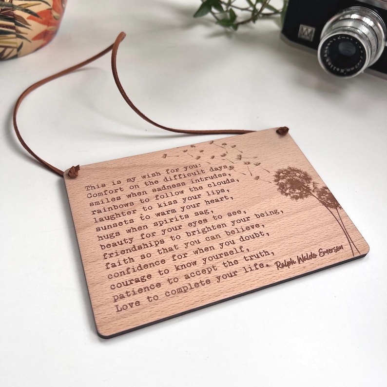 Wooden sign featuring the poem by Ralph Waldo Emerson entitled This Is My Wish For You. Add any message to the back of the sign. Comes complete with faux suede cord to hang anywhere in the home.