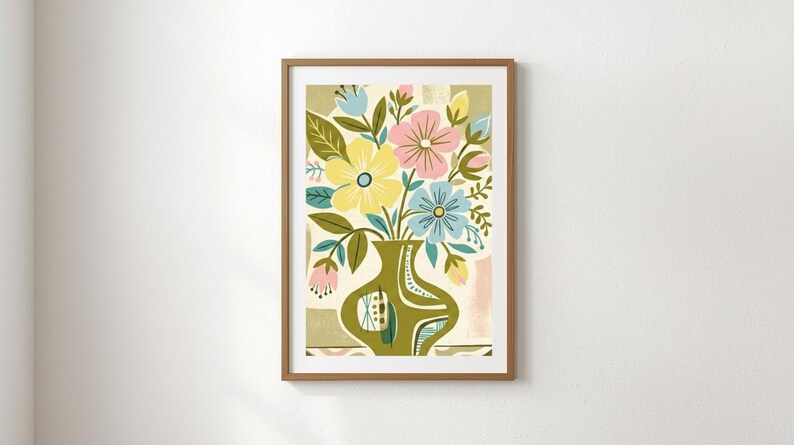 Peut inclure: Une impression d'art encadr&eacute;e repr&eacute;sentant un arrangement floral color&eacute; dans un vase vert. Les fleurs sont dans des tons de jaune, rose et bleu, avec des feuilles vertes. Le vase a un design unique. L'&oelig;uvre est sur un fond neutre.