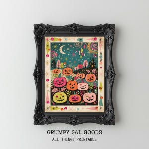 May include: A framed print featuring a dark teal night sky with a crescent moon, stars, and a haunted house silhouette above a field of colorful jack-o'-lanterns in shades of pink, orange, and yellow, surrounded by a decorative border.
