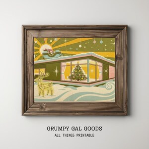 May include: A framed print featuring a mid-century modern house with a Christmas tree in the window, a glowing wireframe reindeer in the snow, and a sleigh flying across a yellow sunburst sky. The text GRUMPY GAL GOODS ALL THINGS PRINTABLE appears below.