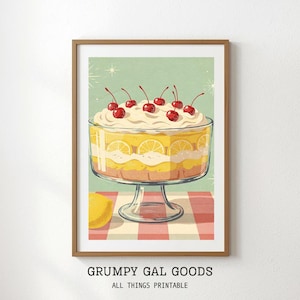 May include: A framed print featuring a vintage-style illustration of a layered dessert in a glass trifle bowl. The dessert has layers of yellow and white, topped with whipped cream and cherries. The background is a light green with a red and white checkered tablecloth.