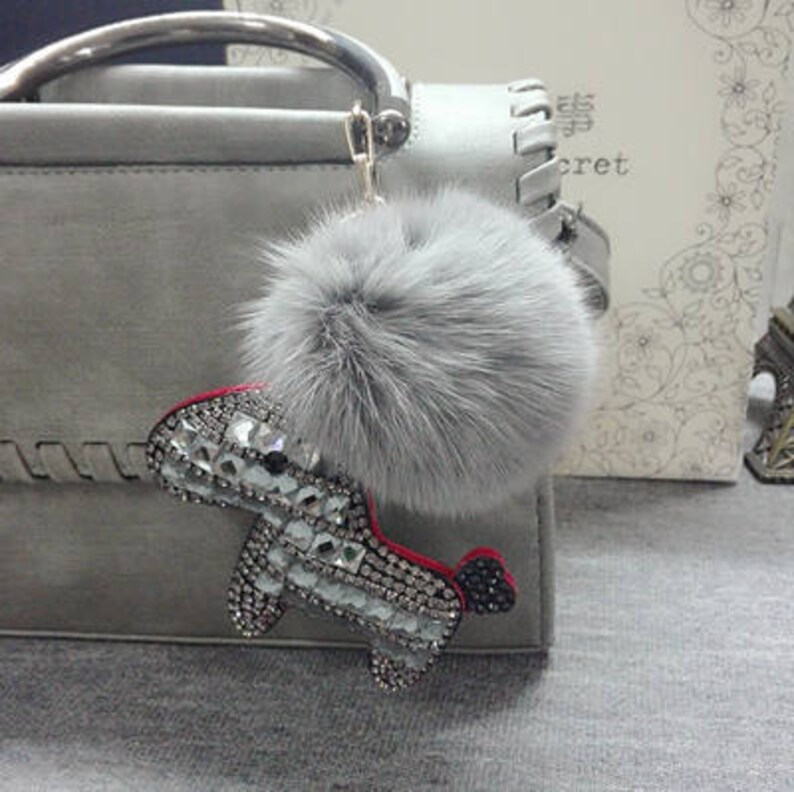 grey fluffy bag