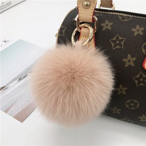 Fur purse charm hot sale