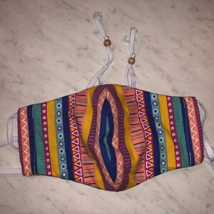 Adult face mask with filter pocket
