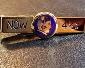 Robbins Co. Attleboro gold tone tie clip