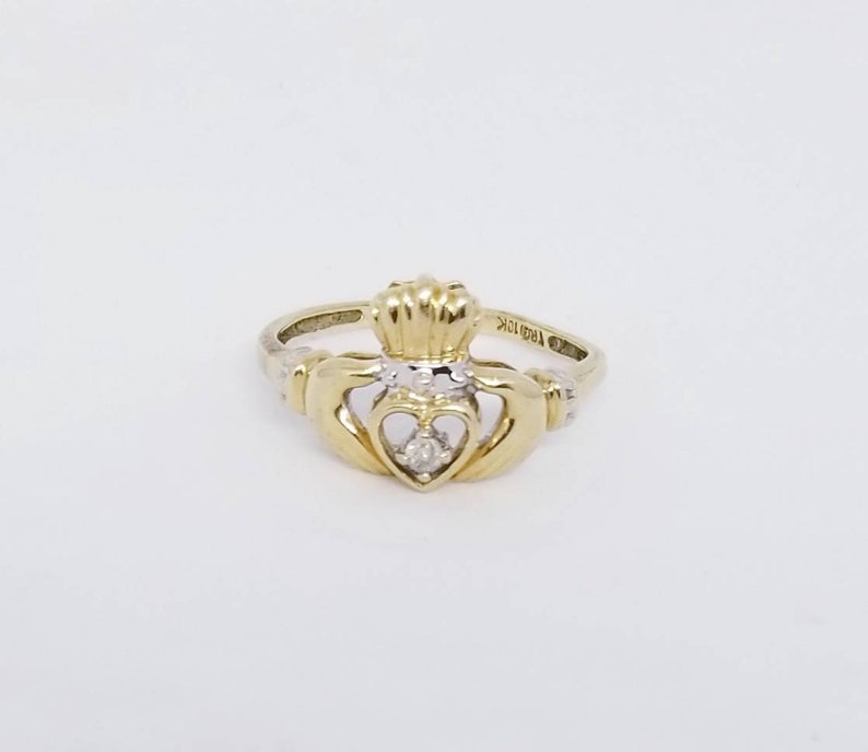 10k TRD Celtic Claddagh ring with solitaire diamond