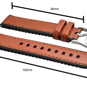 May include: A brown leather watch strap with black stitching and a black rubber lining. The strap is 120mm long and 80mm wide. It has a steel buckle and is available in 20mm and 22mm widths.